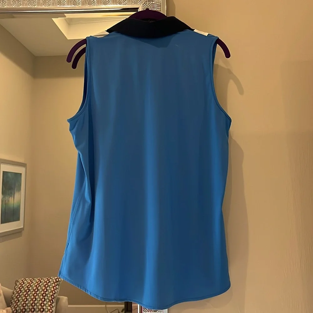 Blue Sleeveless golf Top with navy and White Accents. - Picture 3 of 5